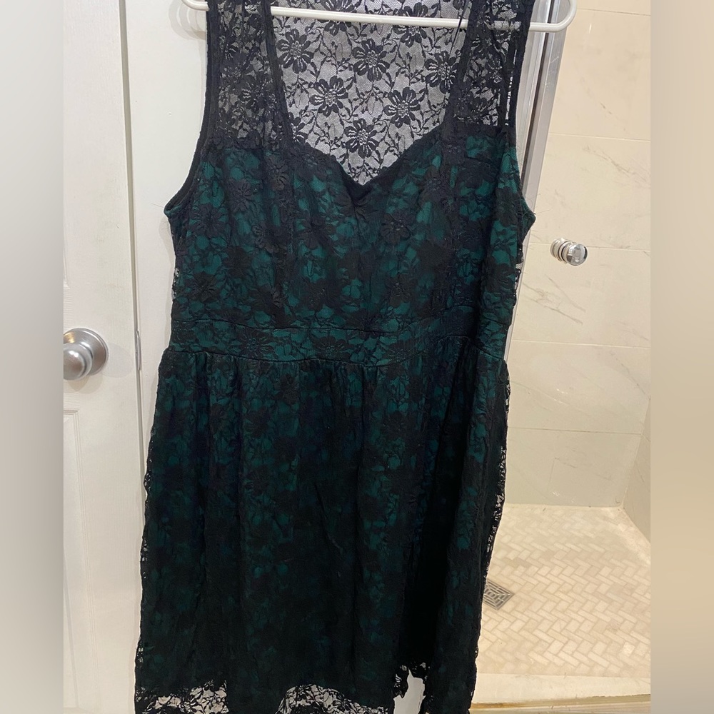 Green silky dress with black lace overlay